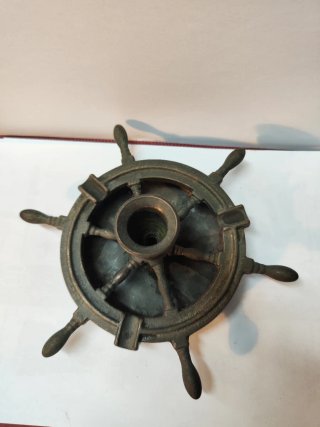 Vecchio portacandele timone in bronzo