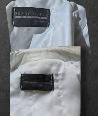 Colete de couro com pelo branco