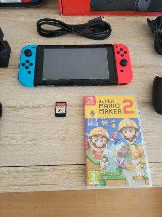 Nintendo Switch como NUEVA + Juegos y Accesorios