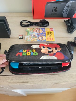 Nintendo Switch como NUEVA + Juegos y Accesorios