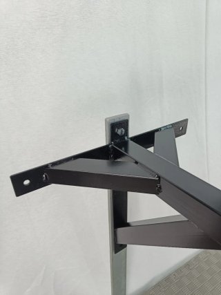 Soporte de pared para saco de boxeo