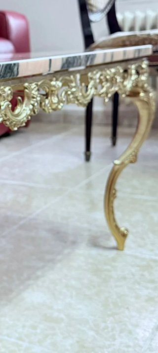 Mesa de centro mármol rosa y bronce