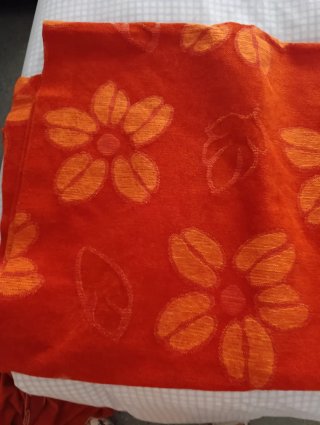 Ropa de camilla naranja lisa Tapete con dibujos