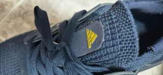 Zapatillas Adidas chico azul y dorado