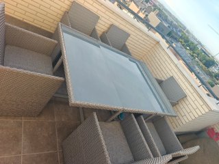 Mesa y 6 Sillas jardín mimbre/cristal