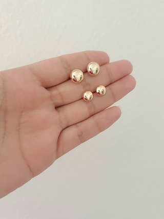 Pendientes botón dorados