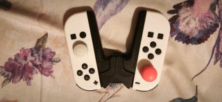 Nintendo Switch OLED Negra y Amarilla