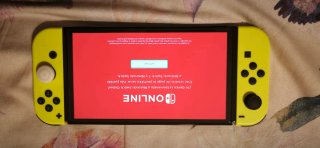 Nintendo Switch OLED Negra y Amarilla