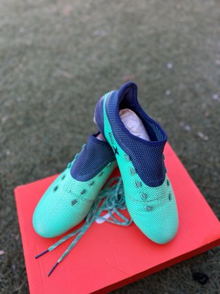 Botas de fútbol Adidas verdes y azules