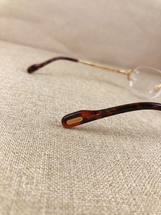 Gafas Cartier doradas