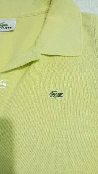 Polo sin mangas mujer Lacoste