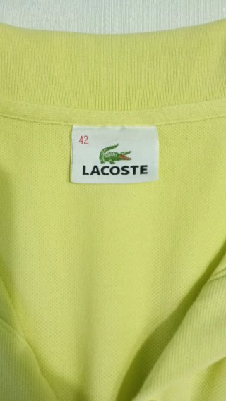 Polo sin mangas mujer Lacoste