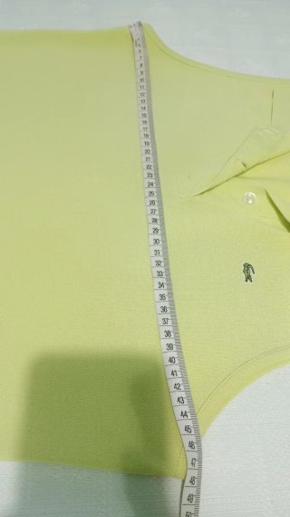 Polo sin mangas mujer Lacoste