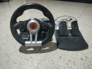 Volante y pedales para juegos