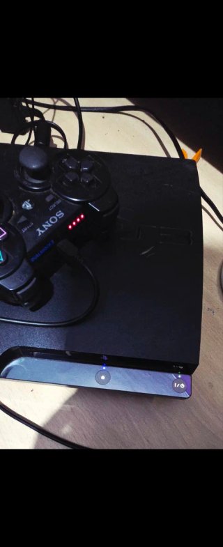 Consola PS3 Slim + 2 Mandos (Negro y Rojo)