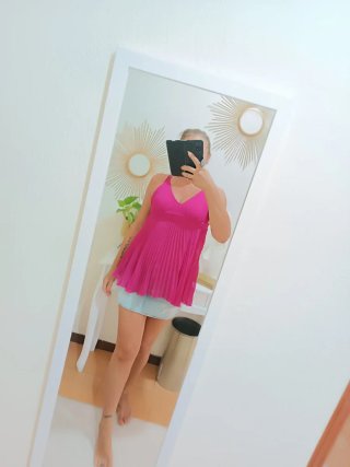 Top lungo fucsia plissettato