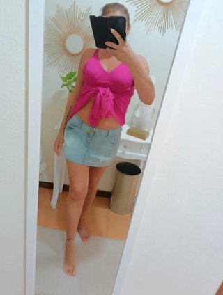 Top lungo fucsia plissettato