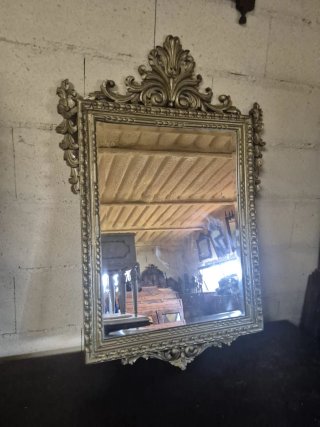 Espejo de madera tallada