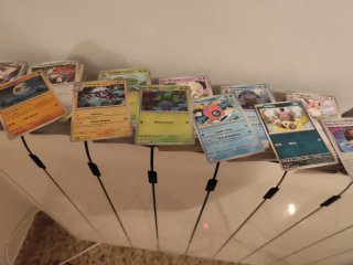 Lote de más de 800 cartas Pokémon + 150 códigos