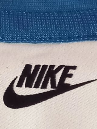 Chaqueta Nike vintage azul y blanca – talla M