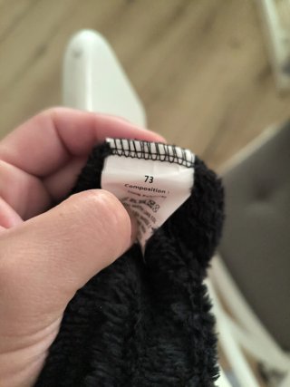 Buzo de gato negro para bebé