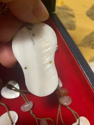 Collezione di bijoux con madreperla e pietre