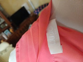 Top Liu Jo S plissettato con fiocco corallo