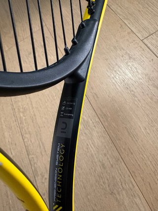 Raqueta de tenis amarilla y negra para niño/niña