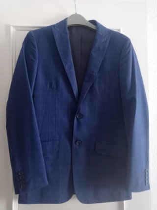 Traje de chaqueta y pantalón azul