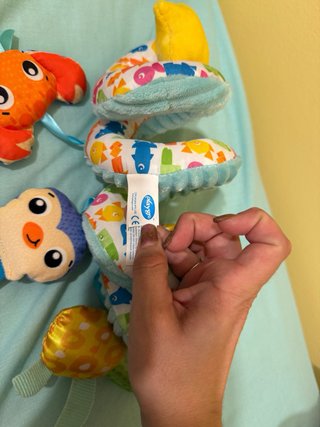 Juguete espiral para carrito de bebé