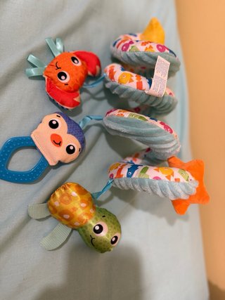 Juguete espiral para carrito de bebé