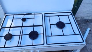 Cocina horno gas butano con porta botellas