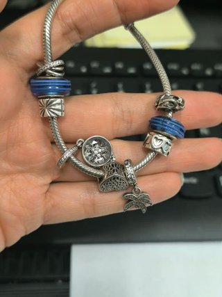 Pulsera Pandora con charms plata