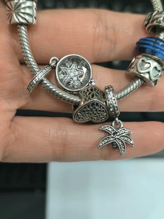 Pulsera Pandora con charms plata