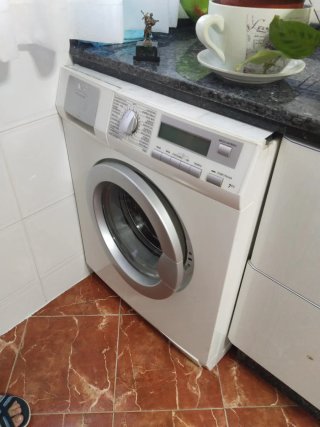 Muebles de cocina blancos y azules