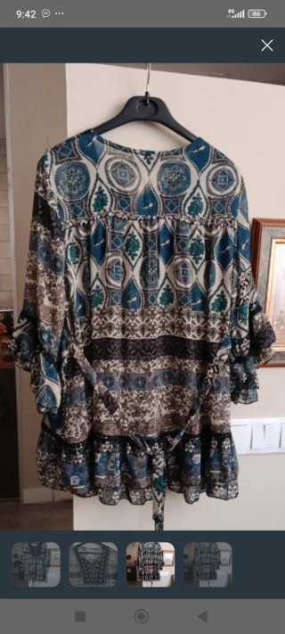 Blusa estampada manga acampanada