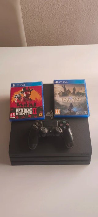 PS4 Pro Negra + Mando + 2 Juegos