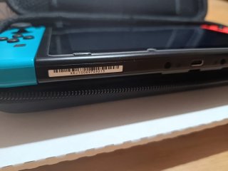 Nintendo Switch V2 completa con Funda.
