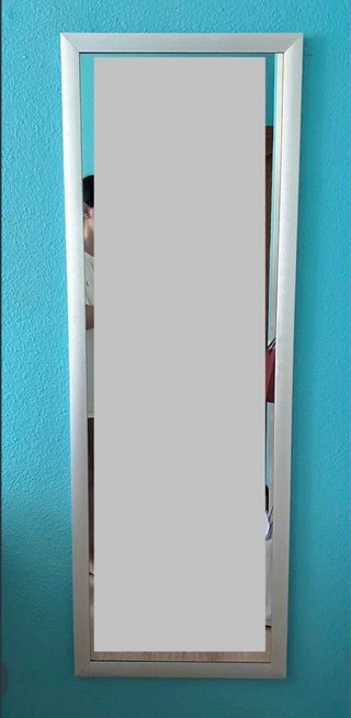 Espejo de pared plateado