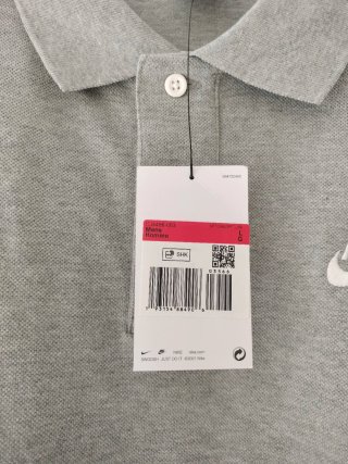 Polo Nike gris talla L