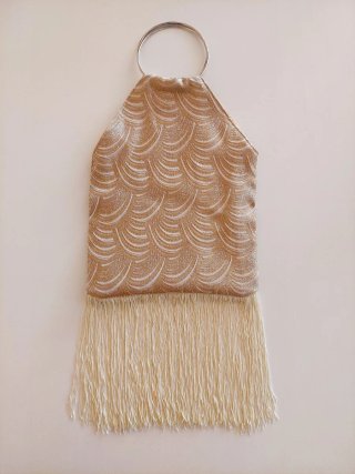 Bolso de fiesta dorado con flecos