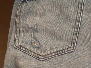 Pantalón corto vaquero desgastado