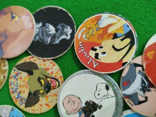 Tazos de dibujos animados variados