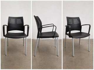 Silla de oficina negra y plateada