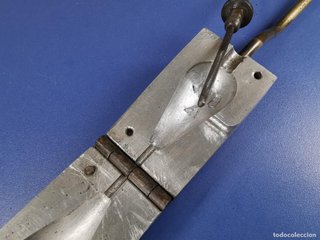 Molde para plomos de pesca