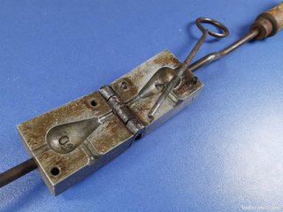 Molde para plomos de pesca