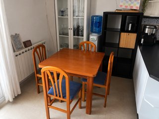 Mesa de comedor extensible de madera