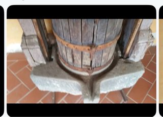 Antico strizzo in legno e metallo