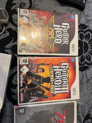 Consola Wii + Guitarra + Juegos