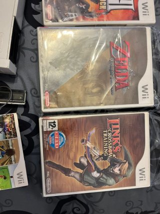 Consola Wii + Guitarra + Juegos